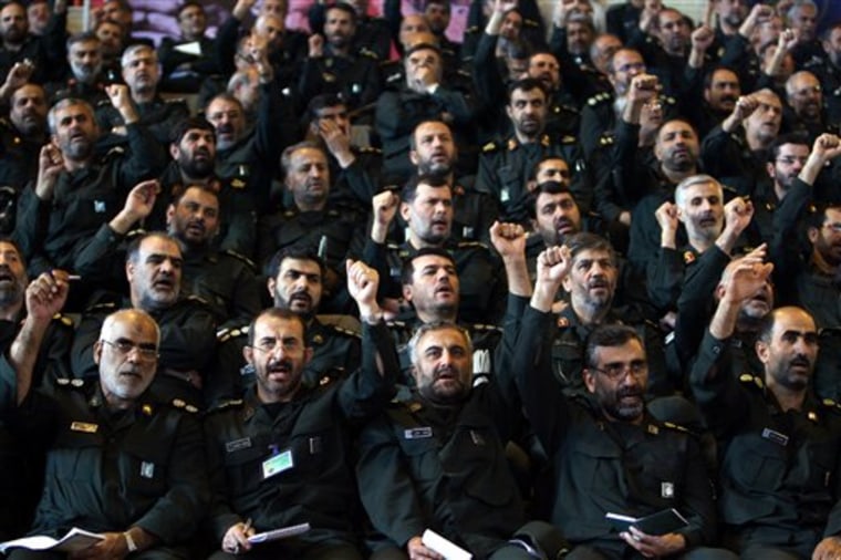 Iranian Revolutionary Guard commanders chant slogans during a September 2007 meeting with President Mahmoud Ahmadinejad, not pictured, in Tehran, Iran.